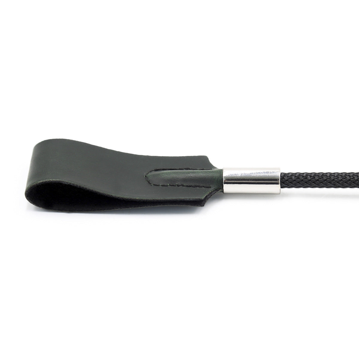 Close-up of square faux leather tip on classic riding crop