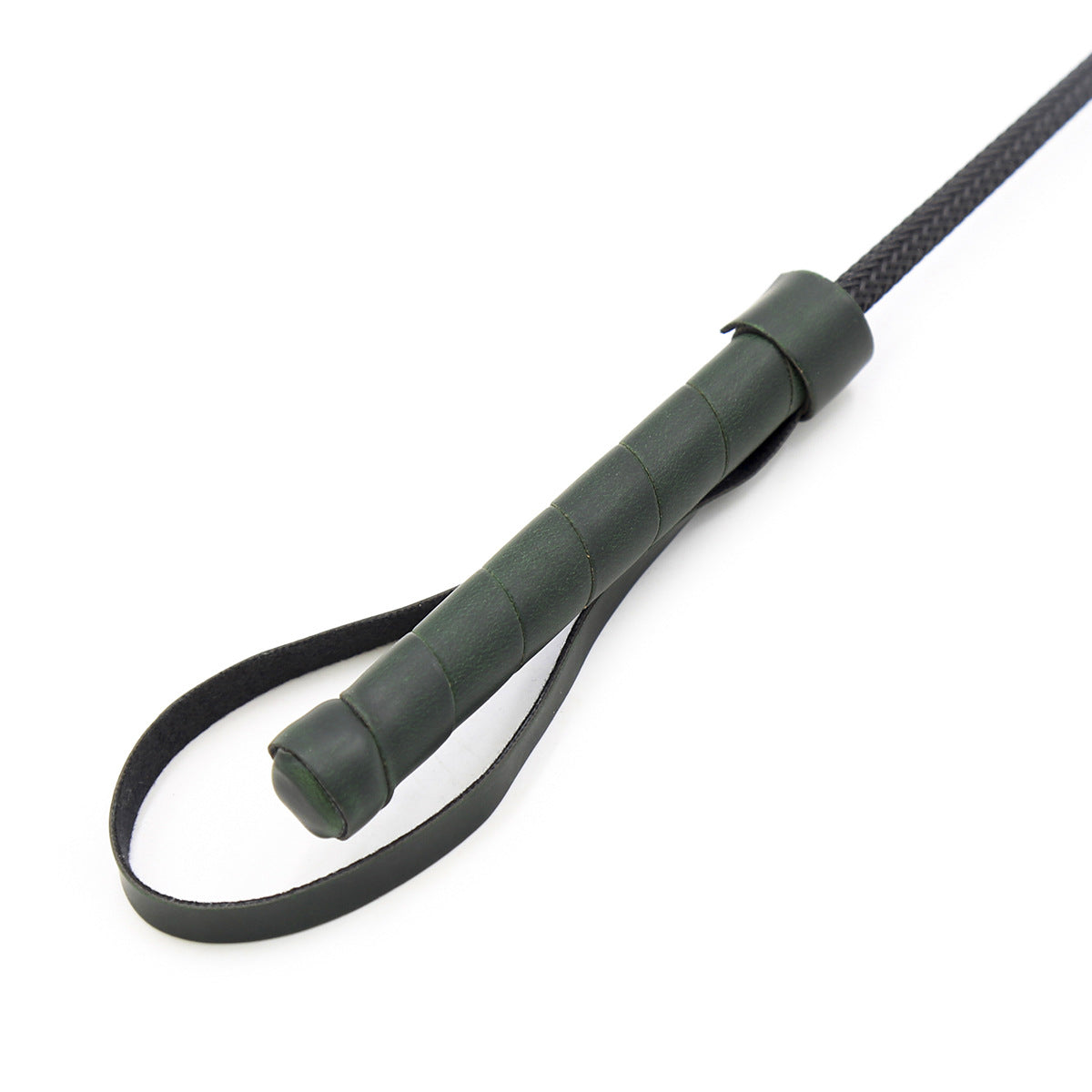 Close-up of woven handle on classic leather riding crop