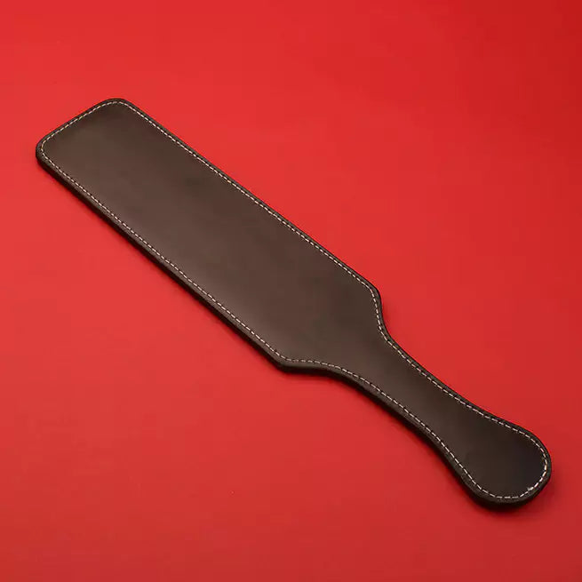 colorful-python-leather-spanking-paddle-red-background-back
