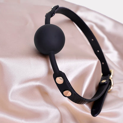 Angled perspective of croc texture silicone ball gag