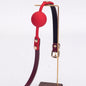 Black and red croc texture silicone ball gag full view
