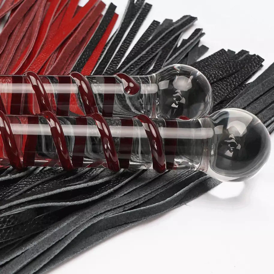 Hardened crystal glass handle detail on leather flogger