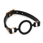 Side view of the black Eye of Horus ring gag showing its open silicone ring structure