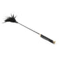 Black feather leather riding crop with gold hardware full view