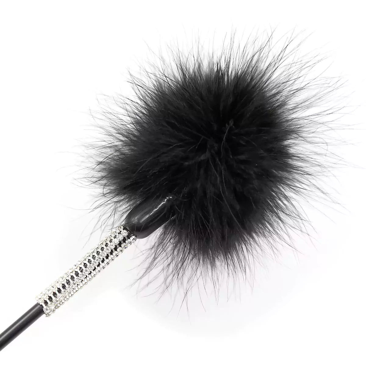 Close-up of soft feather tip on feather silicone heart BDSM crop