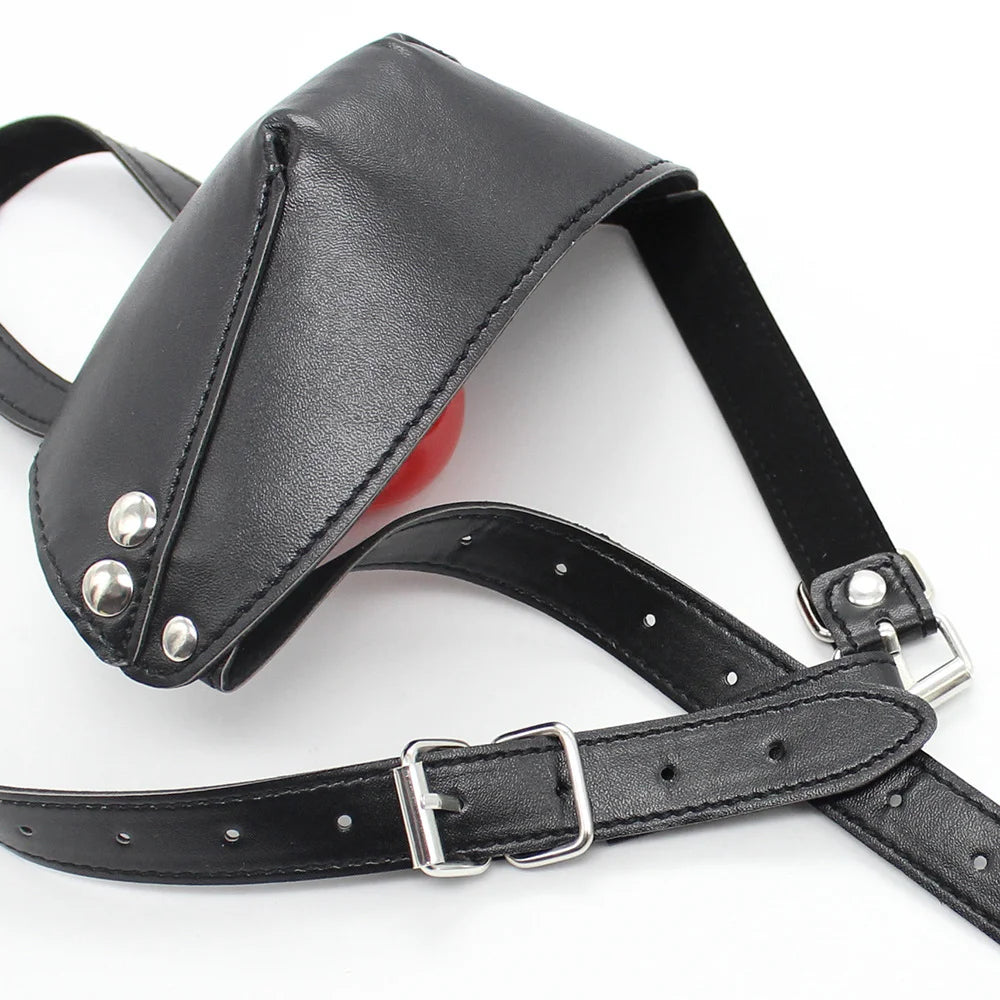 Detail of faux leather harness on full-face gag