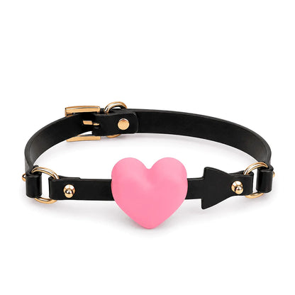 Mordaza de silicona Corazón Flecha — Silicona de grado alimenticio de 4 cm con forma de corazón y detalle de flecha, cuero auténtico