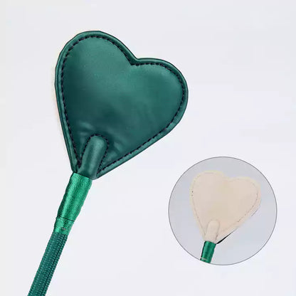 Close detail of heart leather crop head