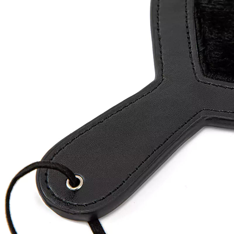 Detail of plush heart paddle handle