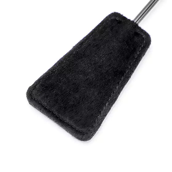 Close-up of lace impact surface texture on lace feather square spanking paddle