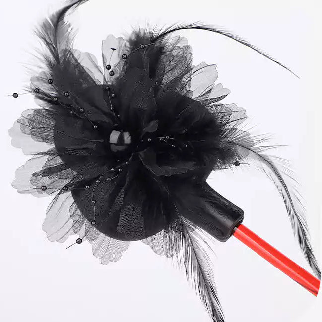 Close-up front view of floral lace mesh head with bead accents