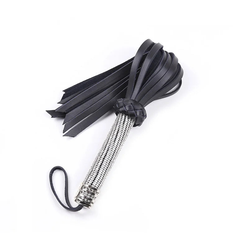 Top view of wide leather flogger tails