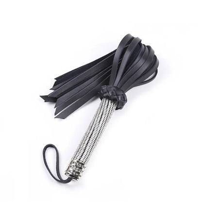 Top view of wide leather flogger tails