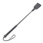 Back view of leather riding crop showing shaft alignment and handle grip