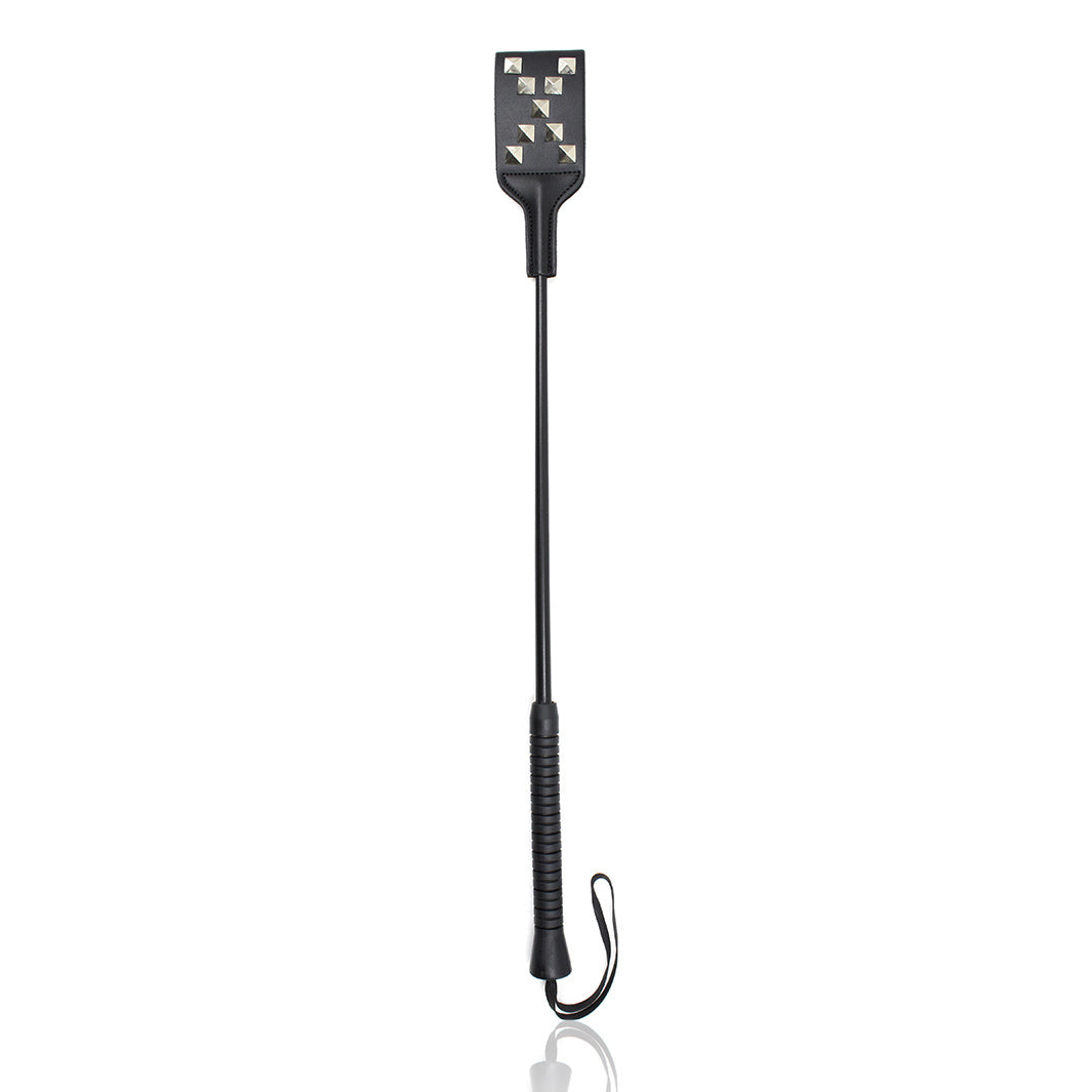 Letter X head leather riding crop full view with stitched X pattern