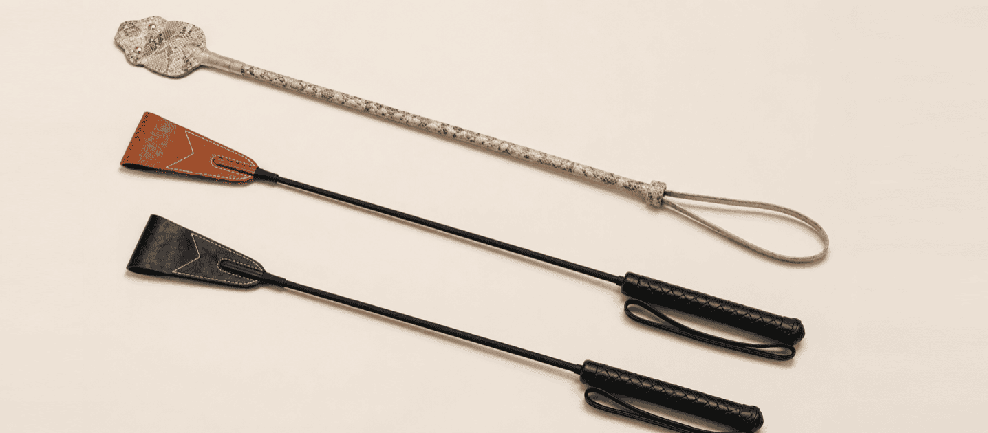 Leather riding crops with firm snap, textured grip, and precise control.