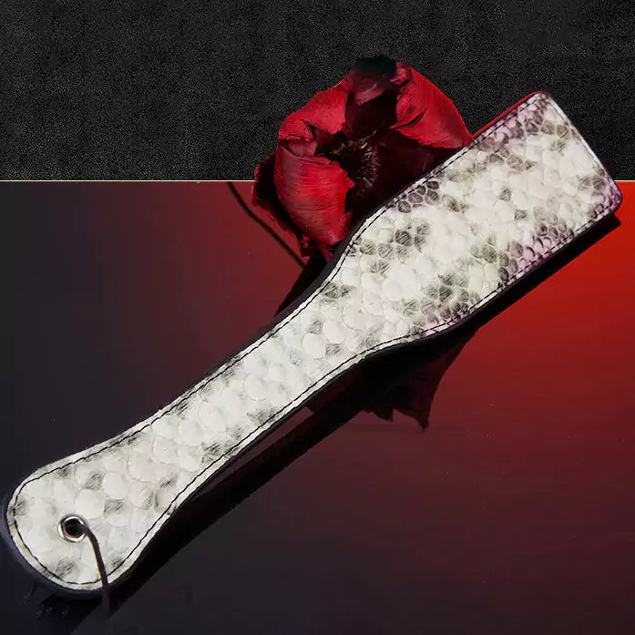 Light gray dual-color snake pattern hand spanker paddle full view