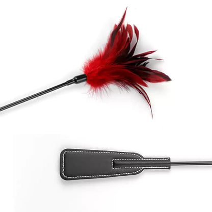 Close-up of feather head on long-handle BDSM riding crop