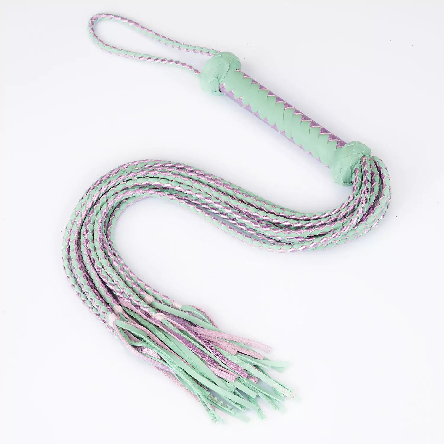 front view of mint and purple nine-tail leather flogger showing flowing braided strands
