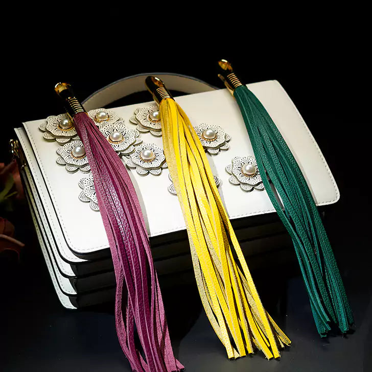 three-color leather flogger set displayed together with mini floggers
