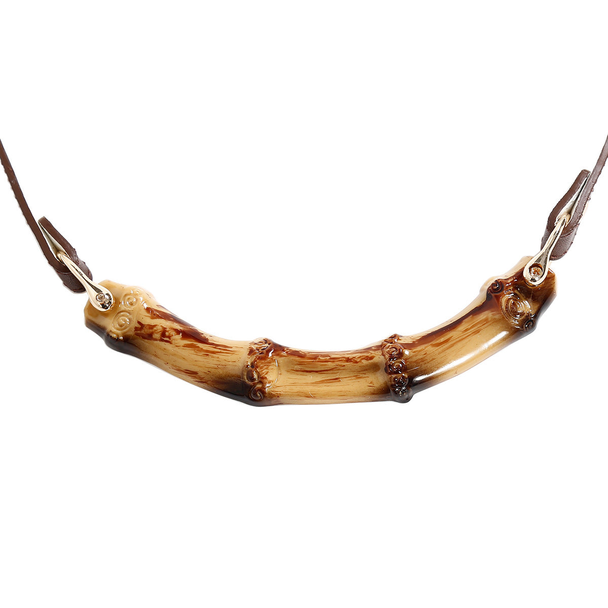Close-up detail of the natural bamboo ball gag and polished bamboo bar mouthpiece
