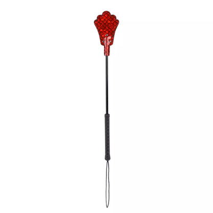 Front view of neon red plaid riding crop showing fan head