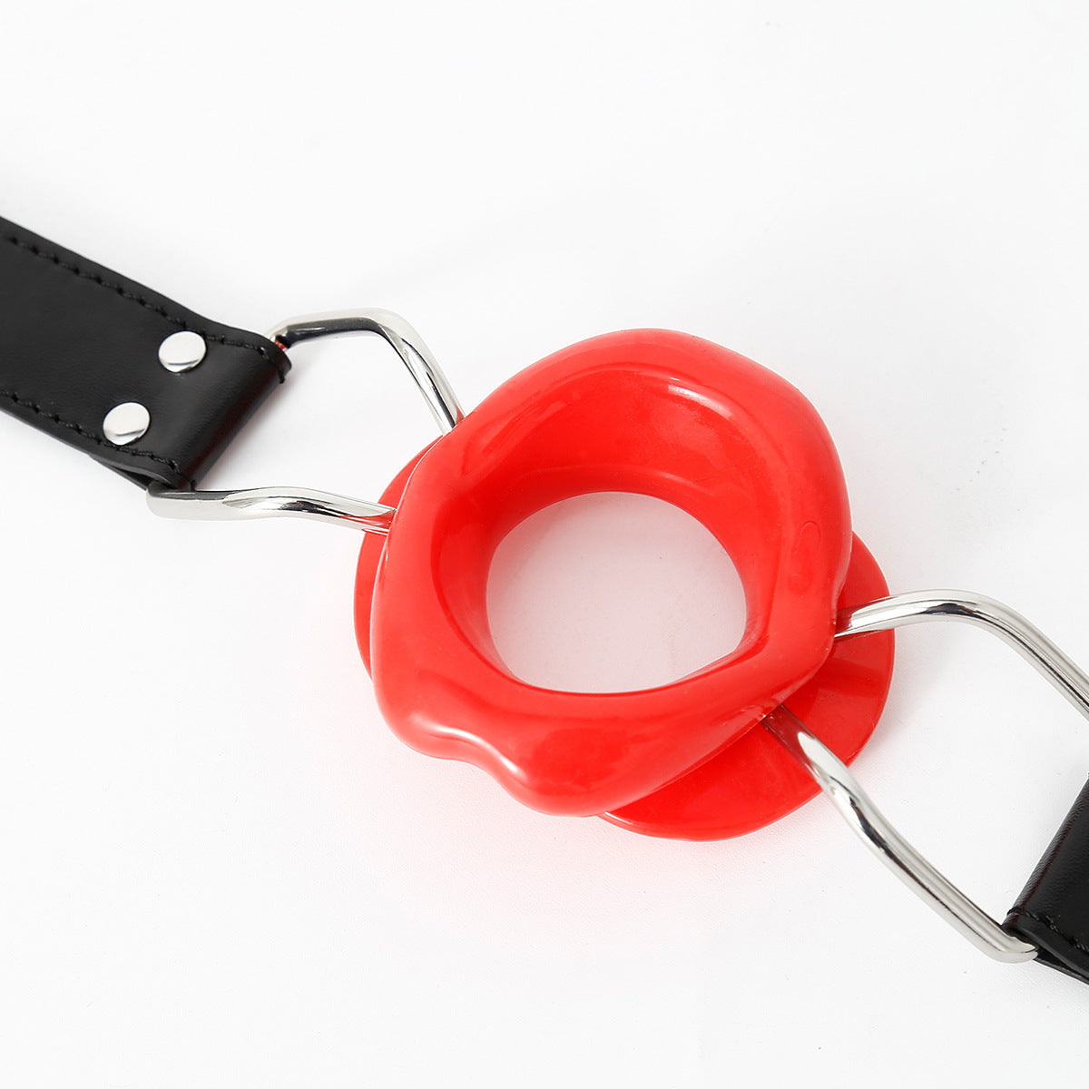 Close-up detail of the red sculpted silicone lip frame on the open mouth gag