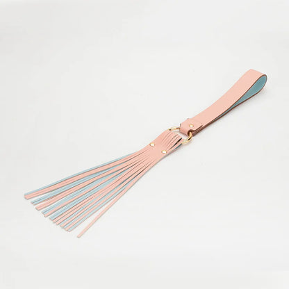 pink strap-style BDSM flogger full display