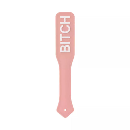 pink silicone paddle with BITCH raised letters