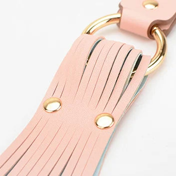 pink strap metal connection detail