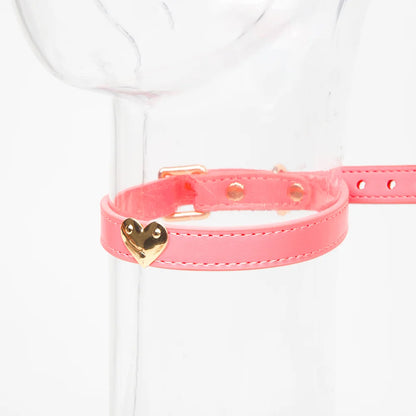 Pink heart leather BDSM collar worn front view