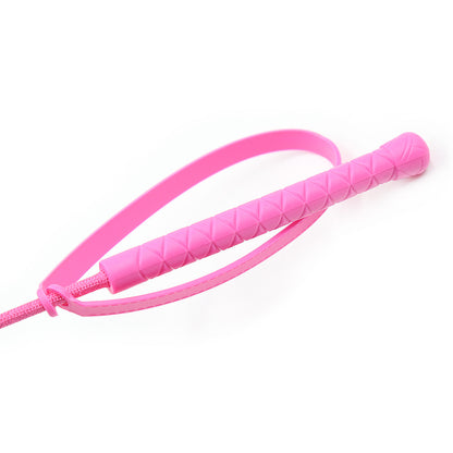 Close-up of pink Lexan polycarbonate handle on riding crop
