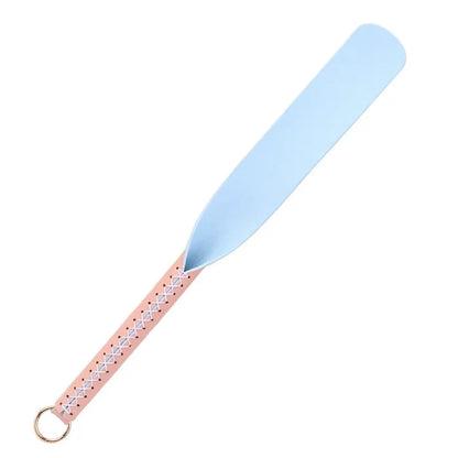 Pink oval silicone spanking paddle full view