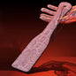 Pink dual-color snake pattern hand spanker paddle full view