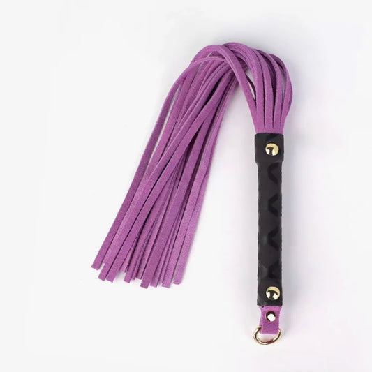 pink suede mini flogger designed for teasing rhythm and beginner-friendly control