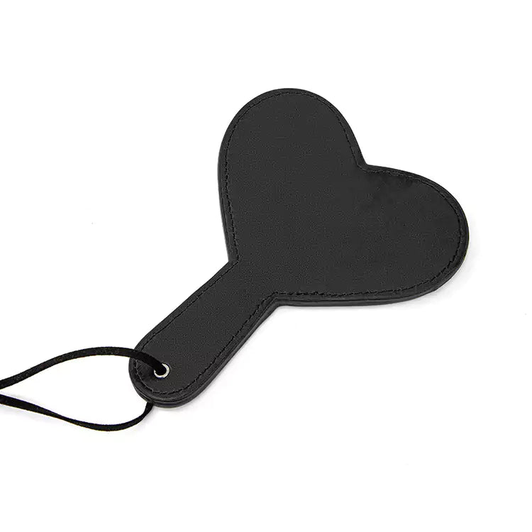 Plush heart spanking paddle styled background scene