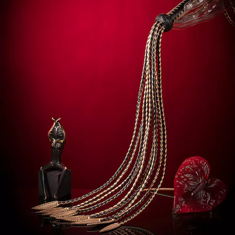 leather flogger in motion demonstrating concentrated sting and visual line tracking