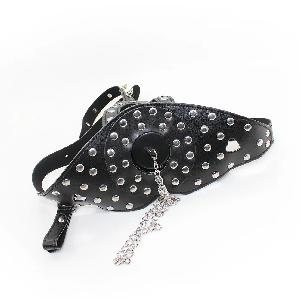 full front view showing spike-studded BDSM muzzle and detachable gag plug