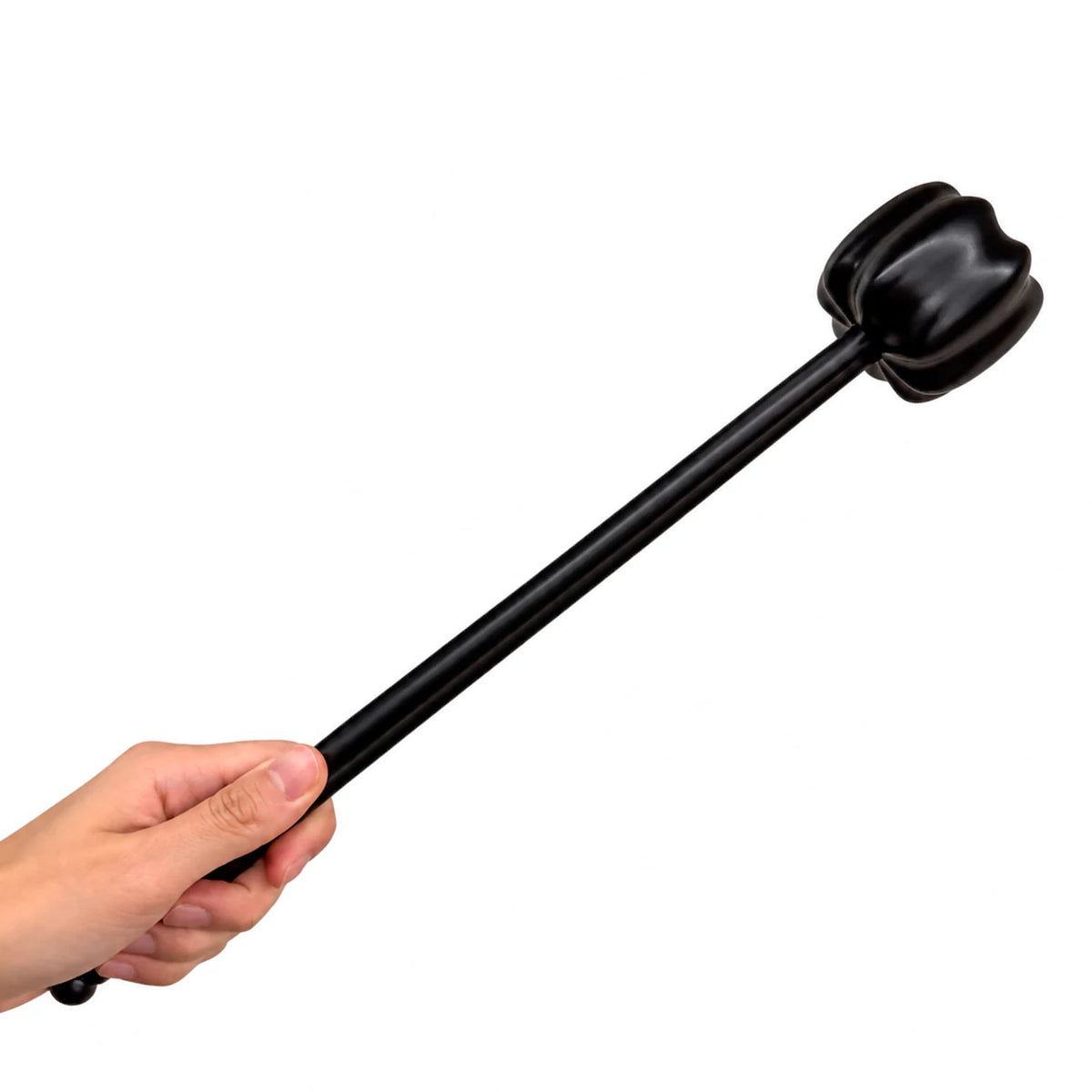Purple ebony wooden spanking mallet shown in hand for scale