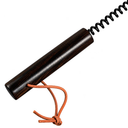 Natural purple ebony wood grain and handle detail on spring spanking mallet