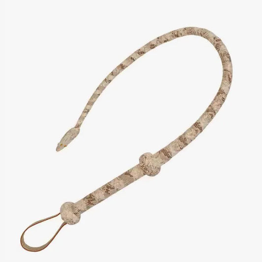 full view of python embossed genuine leather BDSM whip with braided body