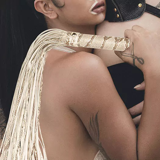 atmospheric scene presentation of heavy-impact python-pattern flogger