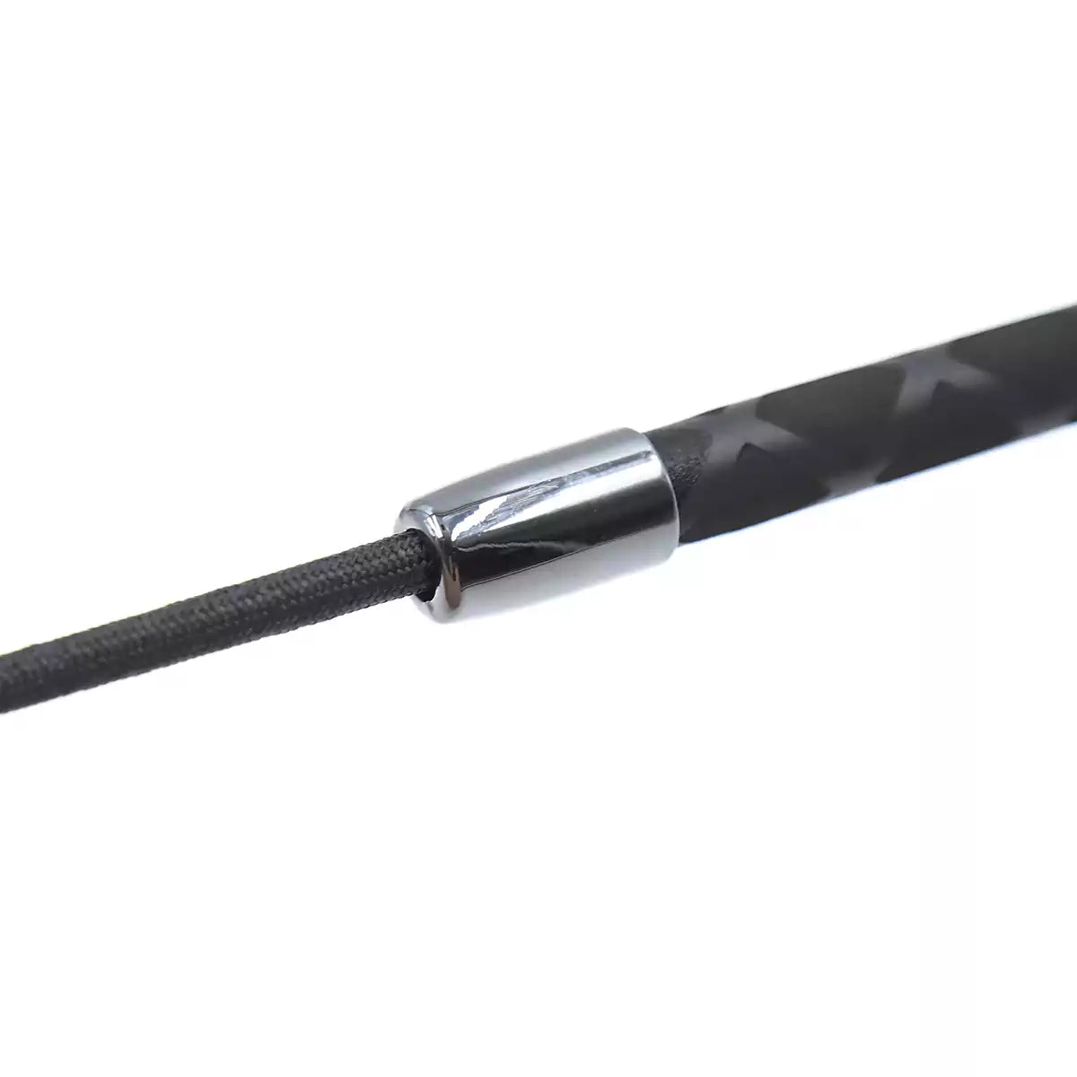 Close-up of anti-slip handle on red heart BDSM riding crop