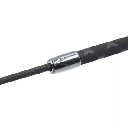Close-up of anti-slip handle on red heart BDSM riding crop