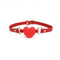Front view of the red heart-shaped silicone ball gag with wide strap