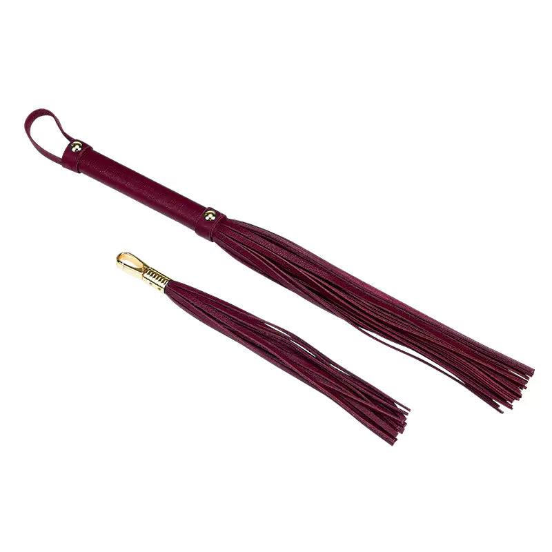 red leather flogger with matching mini tassel keychain