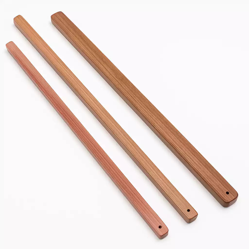 Three sizes of red sandalwood square discipline rods comparison view