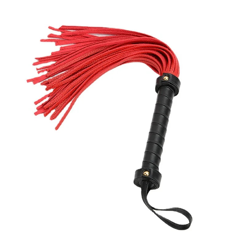 red suede fringe flogger with black handle full product view