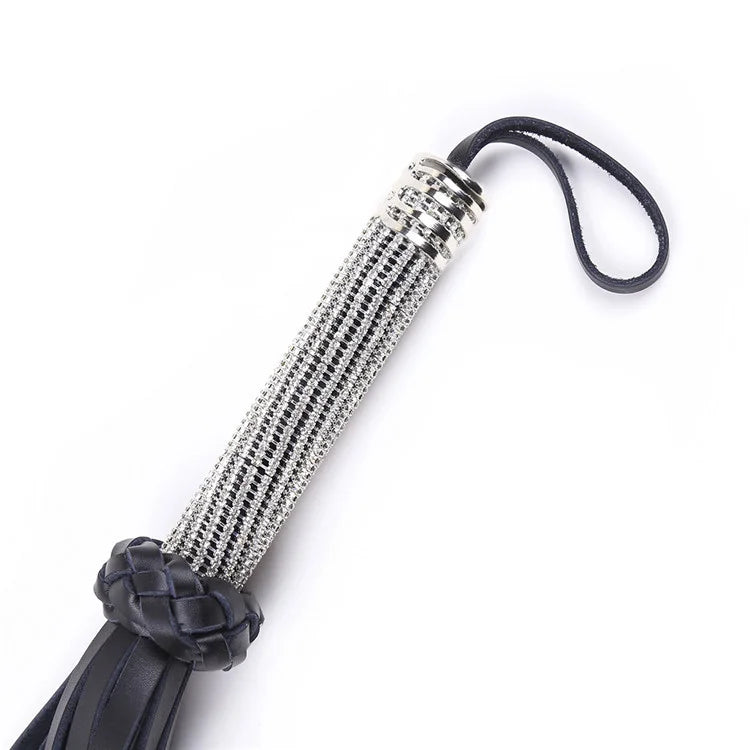 Close-up of rhinestone-studded handle grip
