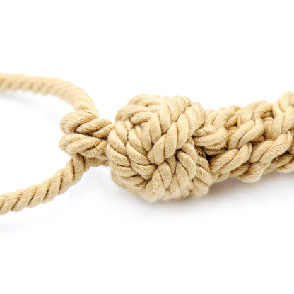 Close-up detail of the handcrafted natural jute weaving on the BDSM ball gag